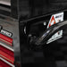 Close-up of a black cabinet door with a handle and 'Pro' branding.