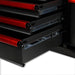 Close-up of a black and red tool chest with open drawers on a white background