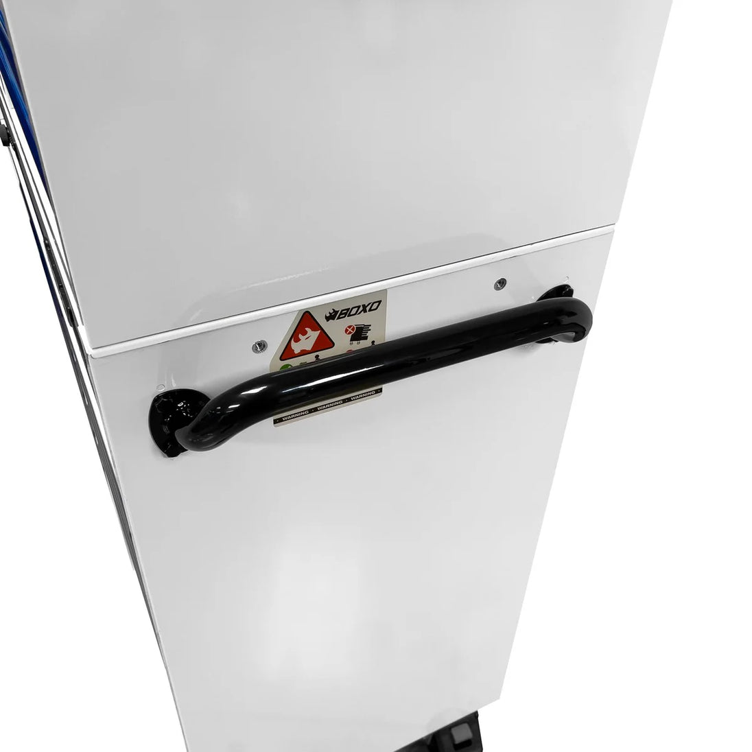 Close-up of a white appliance with a black handle and safety label on a white background