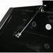 Black metal tool on a black surface with a white background