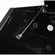 Black metal tool on a black surface with a white background