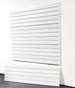 White slatwall panel on a white background