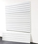 White slatwall panel on a white background