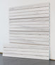 Wooden slat wall panel on a white background