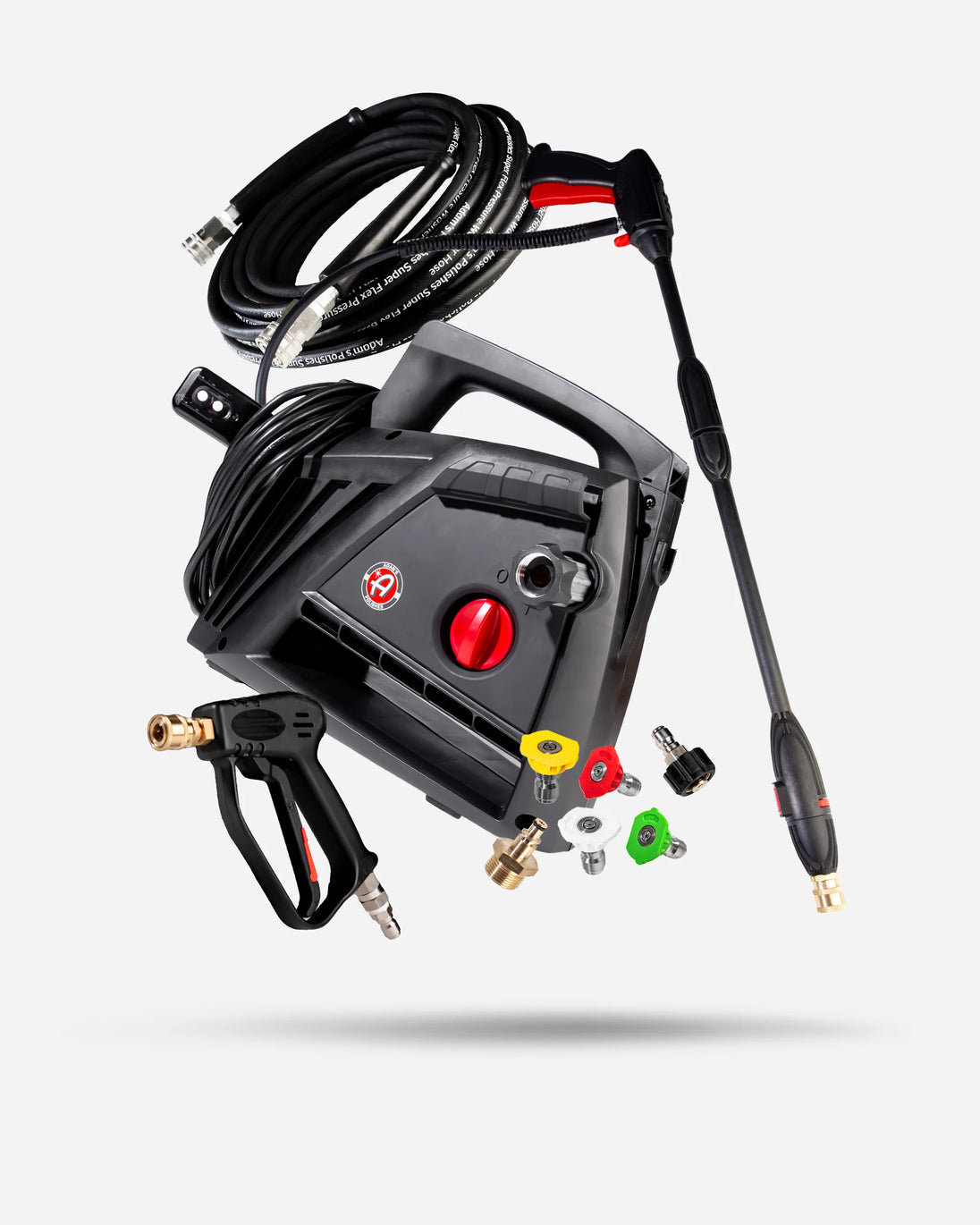 Black high-pressure washer kit with coiled hose, spray wand, two nozzles, and mounting hardware, shown floating on a light gray background.