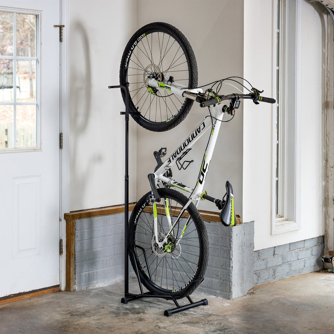 Bicycle on a stand in a garage setting