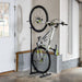 Bicycle on a stand in a garage setting