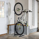 Bicycle on a stand in a garage setting